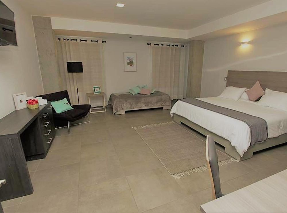 Maria Ines Hotel Suite San Agustin de las Juntas Buitenkant foto