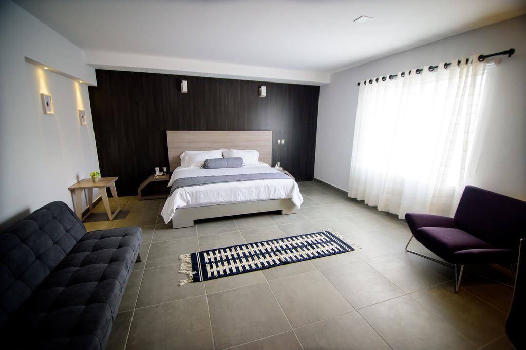 Maria Ines Hotel Suite San Agustin de las Juntas Buitenkant foto