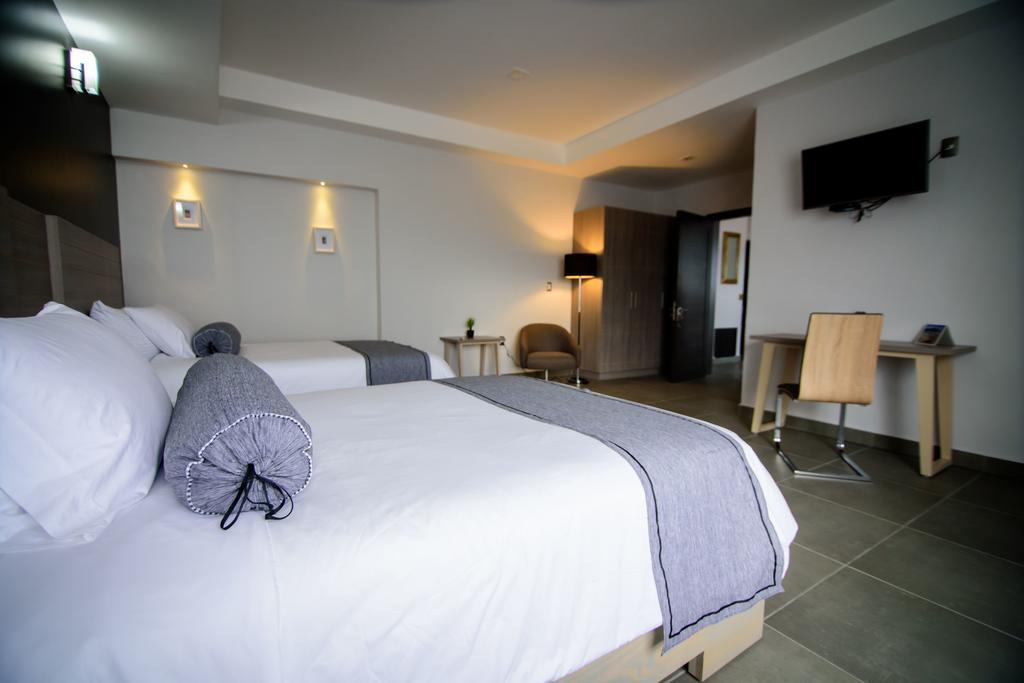 Maria Ines Hotel Suite San Agustin de las Juntas Buitenkant foto