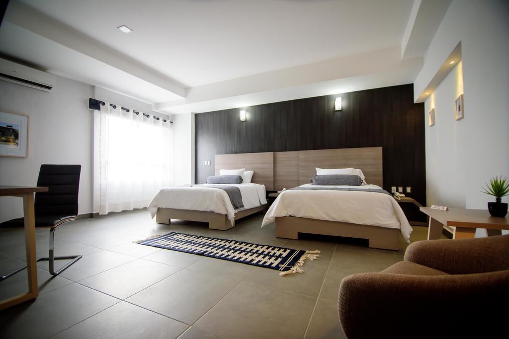 Maria Ines Hotel Suite San Agustin de las Juntas Buitenkant foto
