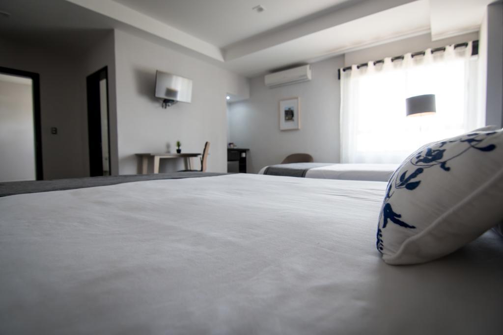 Maria Ines Hotel Suite San Agustin de las Juntas Buitenkant foto