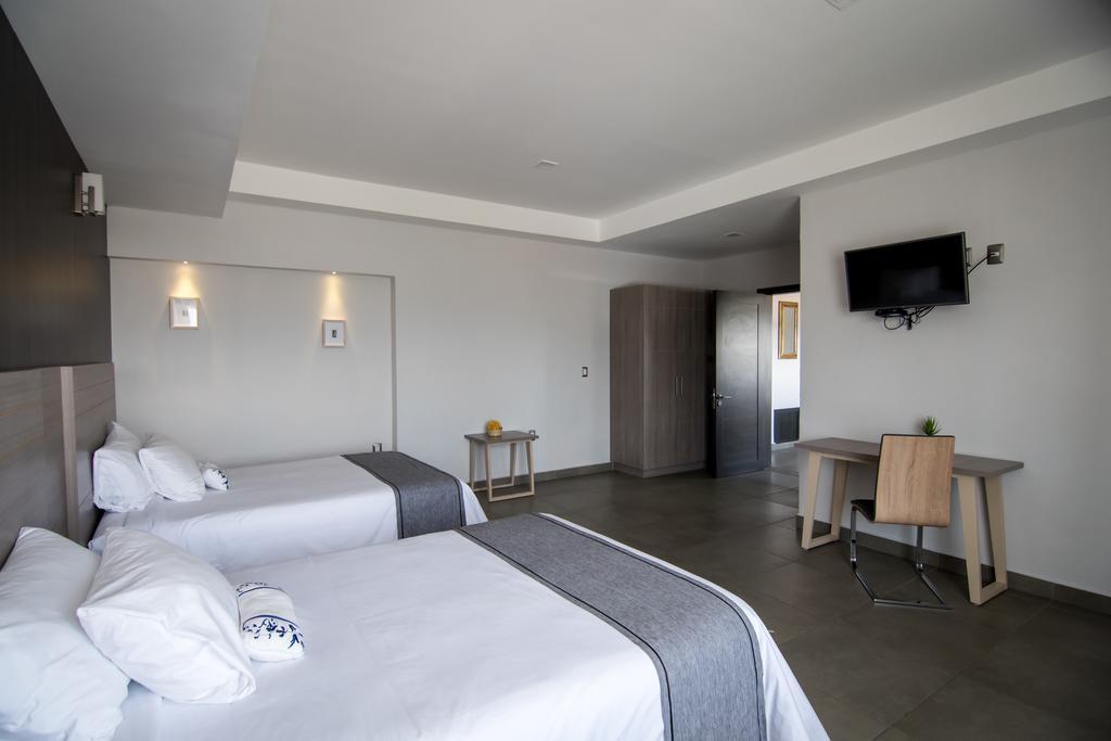 Maria Ines Hotel Suite San Agustin de las Juntas Buitenkant foto