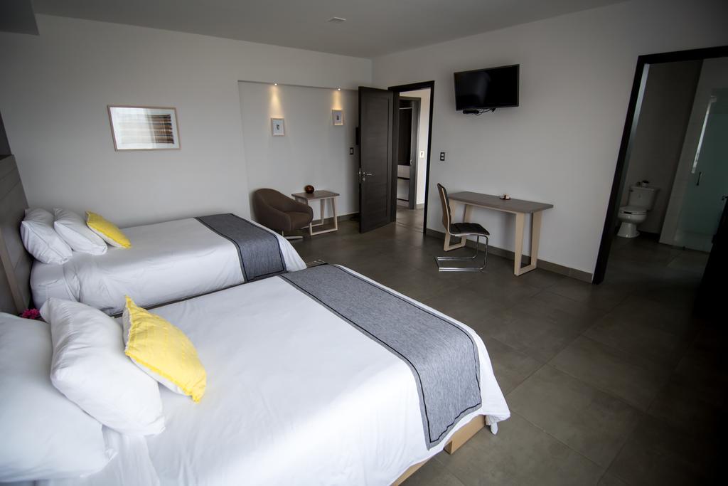 Maria Ines Hotel Suite San Agustin de las Juntas Buitenkant foto